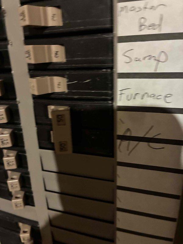 Conducted estimate for complete HVAC system replacement including non-functional air conditioning unit and furnace located in basement mechanical space. Documented existing equipment configuration, electrical panel circuit assignments for furnace and AC units, and assessed utility room conditions to provide comprehensive replacement recommendations.