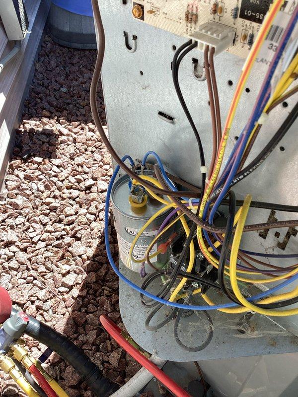 Responded to no cooling call where system had entered safety lockout mode. Upon arrival, inspected outdoor condensing unit and indoor air handler, examining control board, capacitor, wiring connections, and safety circuits. Successfully reset system from lockout condition, verified proper operation of all components, and confirmed unit returned to normal cooling operation.