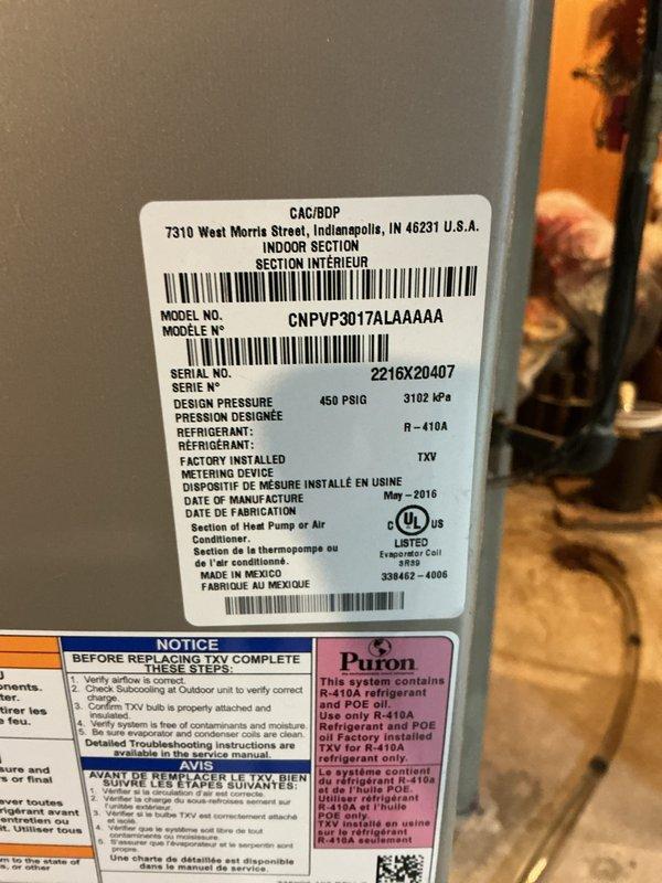 Completed comprehensive air conditioning tune-up on Carrier condensing unit (Model: CNPVP3017ALAAAAA, Serial: Z216X20407) manufactured May 2016 and charged with R-410A refrigerant. Performed standard preventive maintenance procedures including inspection of all major components, verification of electrical connections at disconnect box, assessment of condenser coil condition, and confirmation of proper unit operation on concrete pad mounting.