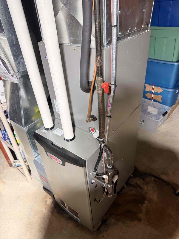 Responded to no cooling complaint on residential split system. Upon arrival, connected manifold gauges to outdoor Lennox condenser unit to verify system pressures and diagnose cooling issue. Customer suspected thermostat malfunction; performed diagnostic testing to determine root cause. System evaluation included pressure readings and operational assessment of both indoor furnace/air handler and outdoor condensing unit to identify failure point and restore cooling functionality.