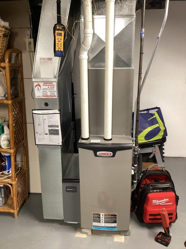 Completed comprehensive AC tune-up on residential HVAC system, performing standard maintenance protocols including inspection of furnace and air handler assembly. Blower wheel was accessed and inspected, showing clean condition with all blades intact and properly secured, indicating good system airflow performance.