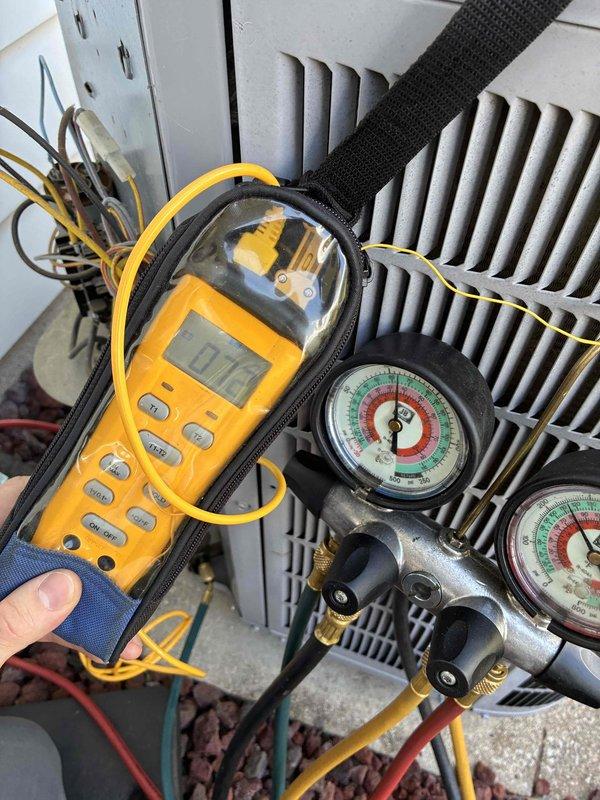 Performed comprehensive air conditioning tune-up and system diagnostics. Utilized digital multimeter and manifold gauge set to measure electrical parameters, refrigerant pressures, and system performance across condenser coils and associated components. All readings verified within manufacturer specifications, system operating efficiently with no deficiencies noted.