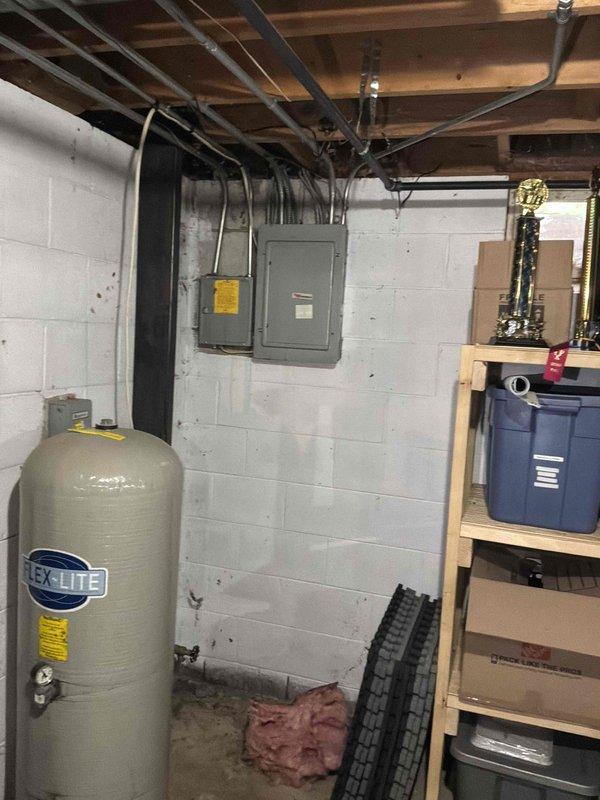Provided estimate for complete HVAC system replacement including outdoor air conditioning unit and basement furnace. Existing AC unit from 1990s/early 2000s operates but produces excessive noise and has never been serviced since original installation. Assessed current equipment condition, documented installation locations, and presented replacement options for both outdoor condensing unit and indoor heating system to improve efficiency and resolve noise concerns.
