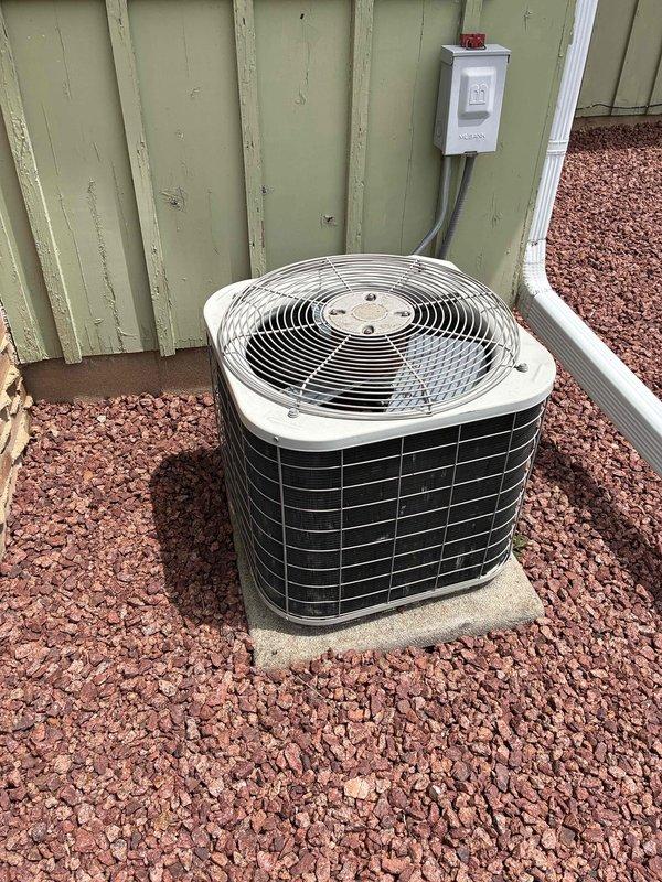 Completed preventive maintenance tune-up on residential air conditioning system at single-family home. Performed comprehensive inspection of outdoor condenser unit, verified electrical connections at disconnect box, checked refrigerant levels, cleaned condenser coils, and tested system operation to ensure optimal performance for the cooling season.