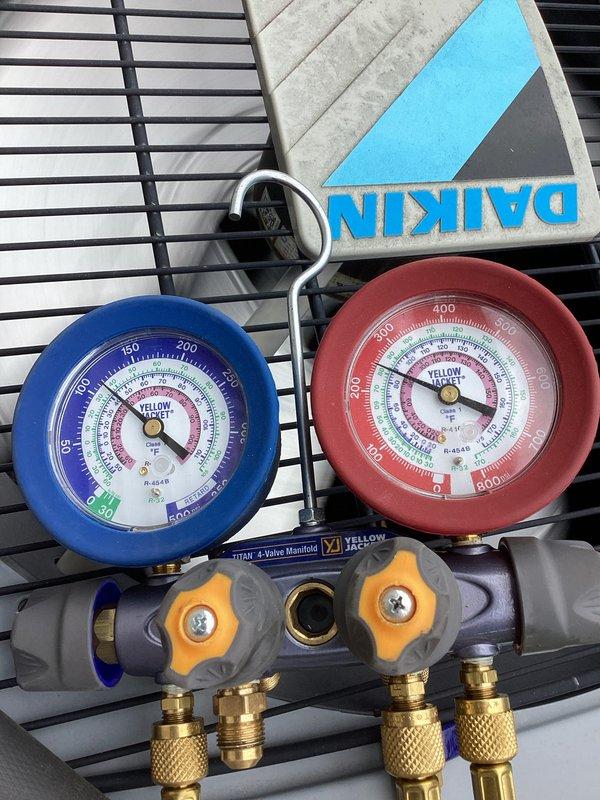 Completed comprehensive AC tune-up service on residential HVAC system. Performed refrigerant pressure diagnostics using manifold gauge set, verified system operating parameters, and inspected furnace unit with associated PVC venting for proper operation and clearances.