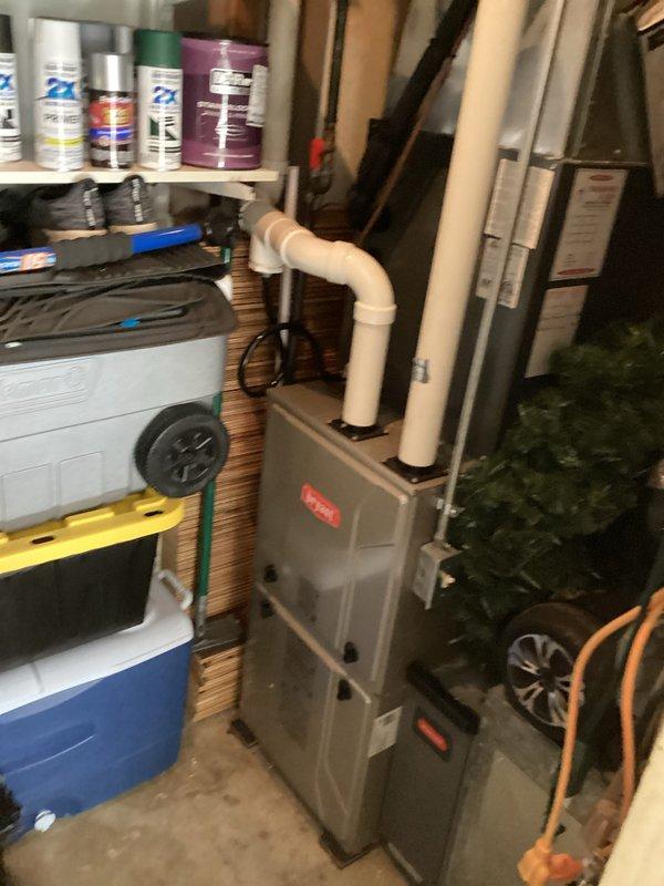 Completed comprehensive AC tune-up service on residential HVAC system. Performed refrigerant pressure diagnostics using manifold gauge set, verified system operating parameters, and inspected furnace unit with associated PVC venting for proper operation and clearances.