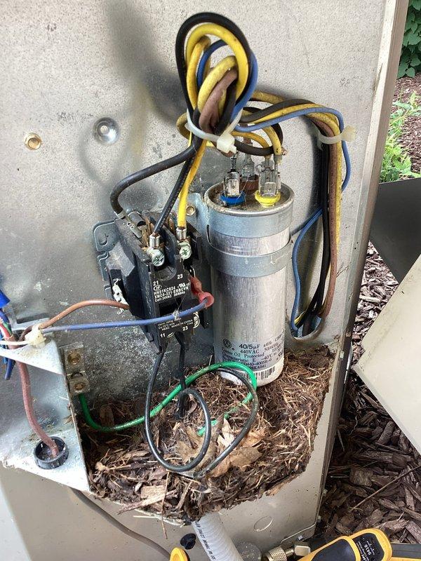 Completed prepaid cooling season maintenance visit on residential air conditioning system. Performed comprehensive inspection of outdoor condensing unit, verifying proper electrical connections at capacitor and contactor, checking refrigerant levels, and cleaning condenser coils. Inspected indoor air handler unit, assessed blower motor operation, verified proper airflow, and checked all electrical connections and safety controls. All components found operating within normal parameters. System tested and confirmed cooling properly with no deficiencies noted.