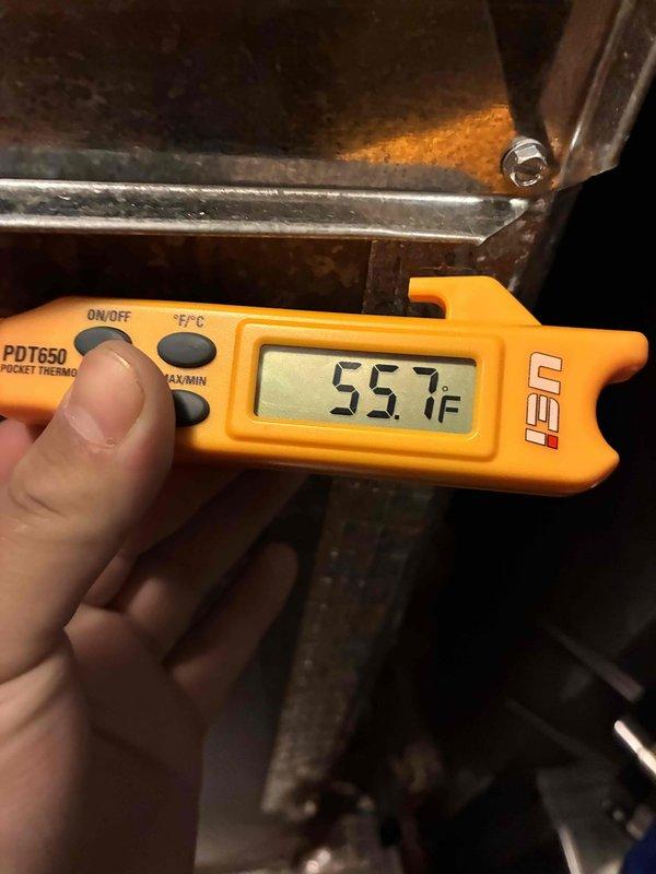 Completed prepaid membership cooling maintenance visit. Inspected and verified air filter condition, noting previous service date marking of 3-12. Measured supply air temperature at 55.7°F using calibrated digital thermometer to confirm proper system operation and cooling performance. All equipment operating within normal parameters.