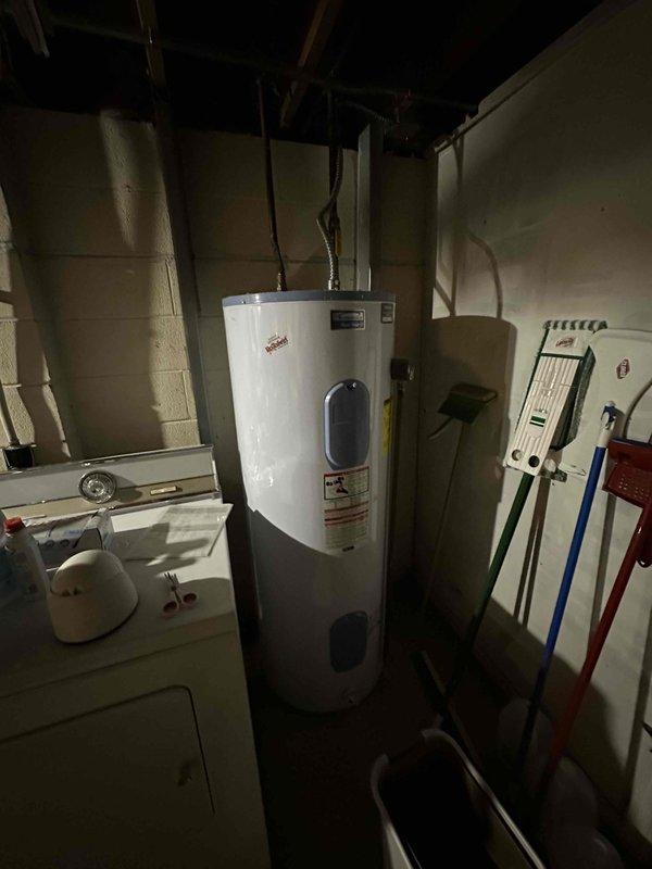 Conducted comprehensive assessment of 41-year-old existing furnace and air conditioning system in residential basement for replacement estimate. Evaluated current HVAC equipment configuration, existing electrical service capacity at main panel, available clearances for new equipment installation, and utility connections including gas lines and condensate drainage. Documented existing system specifications, ductwork conditions, and spatial requirements to provide accurate equipment sizing and replacement recommendations for complete heating and cooling system upgrade.