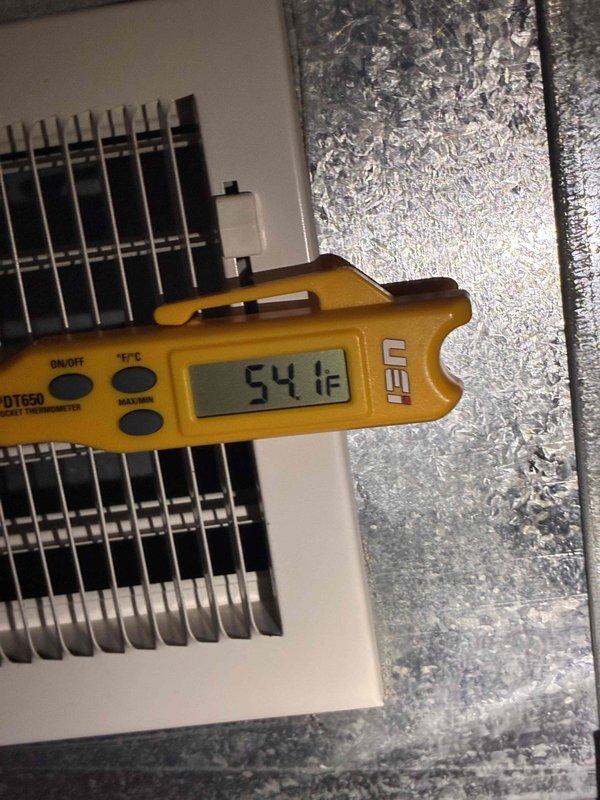 Completed routine A/C tune-up and system inspection as part of recurring membership maintenance visit. Verified proper airflow and temperature differential at supply register, measuring 54°F discharge temperature, and inspected outdoor condenser unit for proper operation and clearance. All components functioning within normal parameters with no issues identified during service.