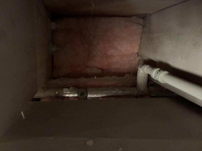 Responded to service call for non-functioning hose bib with broken or seized shut-off valve. Accessed crawlspace area to locate and inspect interior shut-off valve controlling exterior spigot. Valve was found to be locked up and inoperable, preventing proper water flow control to outdoor hose bib. Provided diagnostic assessment and repair estimate to customer for valve replacement.