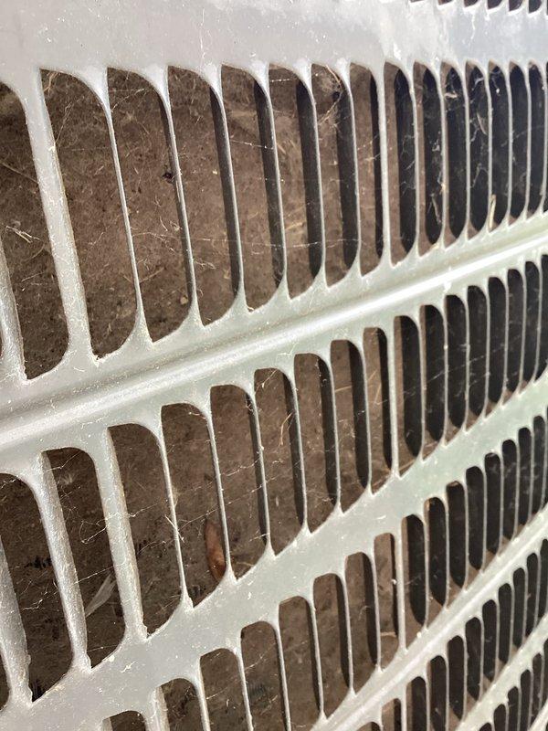 Completed comprehensive A/C tune-up on residential cooling system. Inspected evaporator coil and found moderate accumulation of dust and debris on fins, which was noted for maintenance tracking. Verified electrical connections at outdoor unit, including dual-run capacitor (40/5 µF) and associated wiring terminals, confirming all connections were secure and operational. System tested and running within normal parameters.