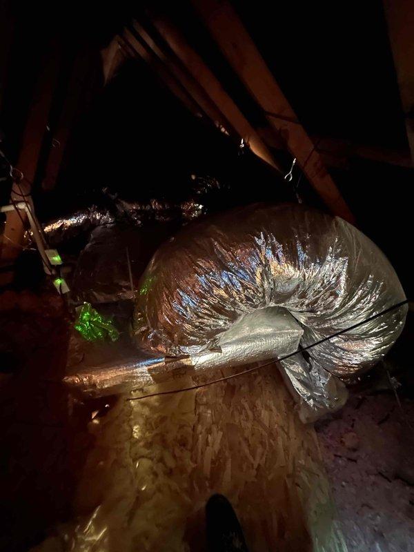 Responded to emergency service call for attic-mounted air handler with connected mini-split system experiencing refrigerant leaks in both units. Assessed dual system configuration in attic space with flexible ductwork and evaluated outdoor condenser unit to determine extent of refrigerant loss and provide replacement estimate for failed components.