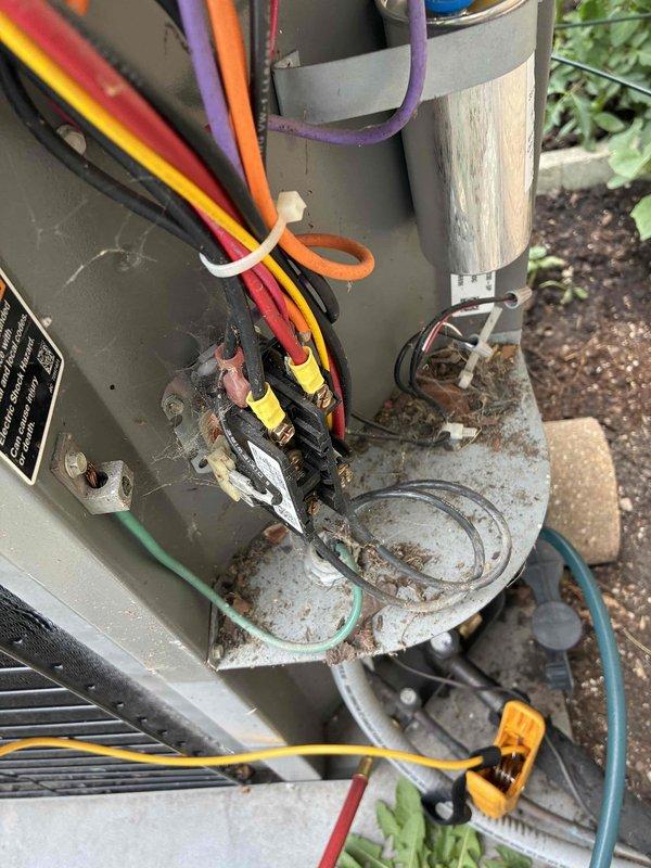 Responded to service call for suspected refrigerant leak on outdoor condensing unit. Upon arrival, conducted visual inspection of unit exterior and internal components, documenting equipment model SD0110F and overall system condition. Unit displayed significant weathering with extensive rust and corrosion present on base plate, housing panels, and metal components, indicating prolonged outdoor exposure. Inspected electrical connections, capacitor housing, and wiring harness for potential leak points and system integrity issues requiring further diagnostic evaluation.
