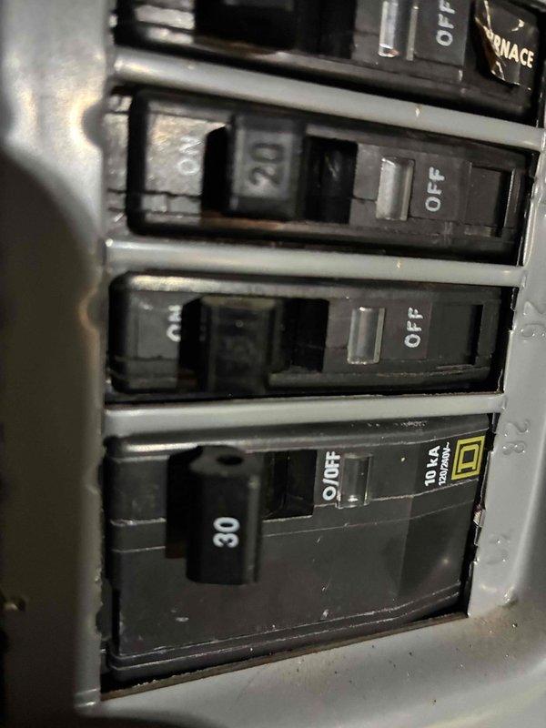 Performed comprehensive assessment of non-cooling Amana air conditioning system experiencing refrigerant loss and evaporator coil icing. Documented existing outdoor condenser unit condition and electrical panel configuration, then provided detailed replacement estimate with financing options for complete system upgrade due to refrigerant leak and compromised cooling performance.