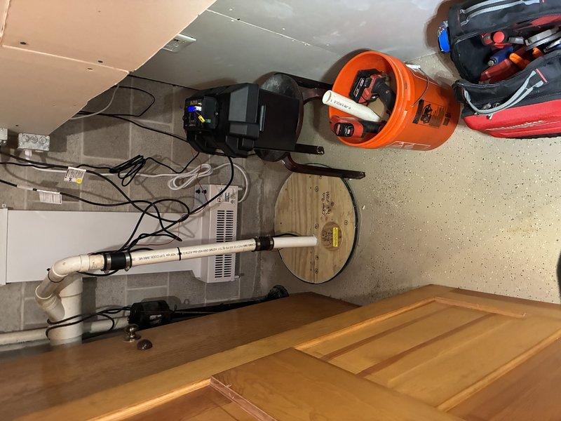 Installed battery backup sump pump system in basement utility area. Completed all electrical connections, plumbing integration with existing discharge piping, and performed operational testing to verify proper functionality of both primary and battery backup components.