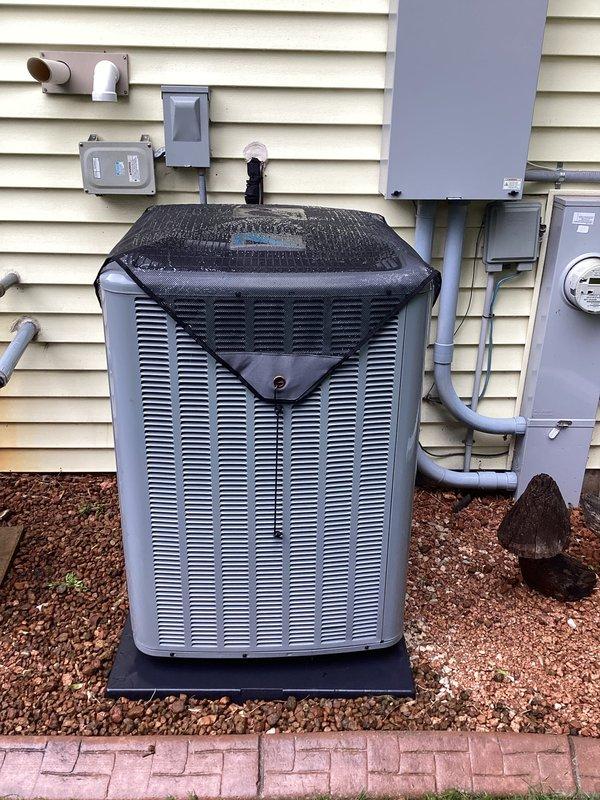 Completed routine A/C tune-up and preventative maintenance service under residential membership agreement. Performed comprehensive system inspection of outdoor condensing unit, verified electrical connections at disconnect box, tested voltage readings with multimeter (544V recorded), and confirmed proper operation of all components including condenser coils, fan motor, and refrigerant lines.