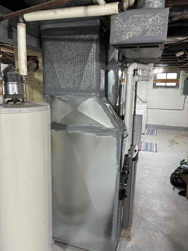 Completed comprehensive HVAC tune-up service on residential furnace and air handler system located in basement mechanical room. Performed standard maintenance protocol including filter inspection, visual equipment assessment, and system operational verification to ensure proper heating and cooling functionality for the upcoming season.