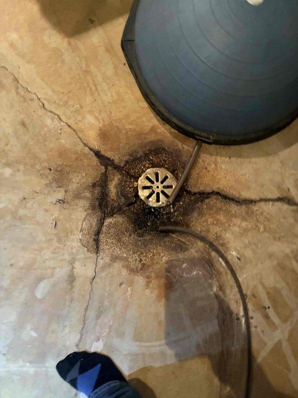 Conducted on-site assessment for complete HVAC system replacement in basement mechanical room. Evaluated existing aging furnace and air conditioning system, documenting current equipment configuration including gas line routing, venting arrangement, and drainage conditions. Photographed mechanical space layout, existing ductwork connections, PVC vent piping, copper refrigerant lines, and floor drain with visible water staining indicating potential condensate management concerns. Provided comprehensive replacement estimate for new high-efficiency heating and cooling equipment suitable for basement installation.