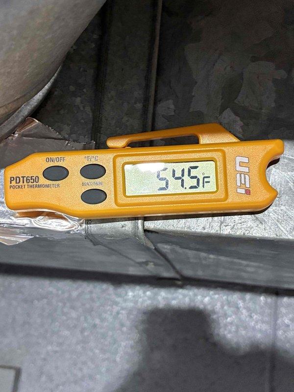 Completed routine cooling system maintenance visit as part of recurring membership agreement. Inspected and evaluated air filter condition, noting visible dirt accumulation and discoloration across pleated media indicating normal usage. Measured supply air temperature at 54.5°F at ductwork, confirming proper cooling operation and system performance within acceptable parameters.