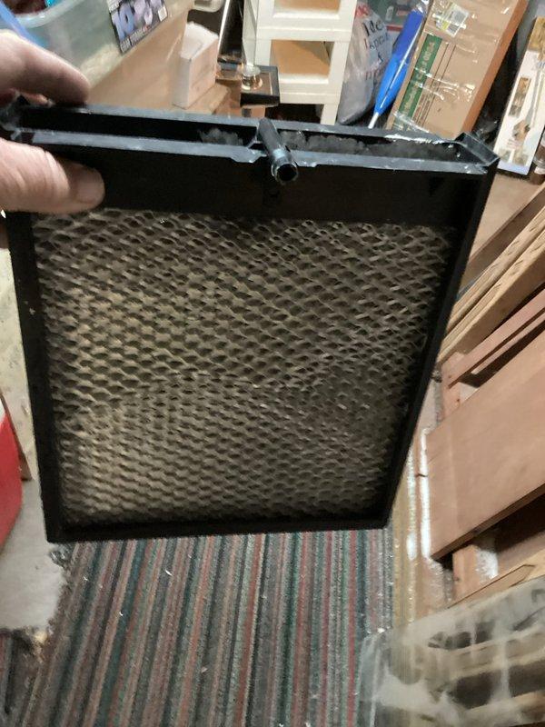 Completed comprehensive cooling system tune-up and maintenance as part of membership agreement, including full system inspection with panel access. Replaced dirty air filter showing significant dust and debris accumulation. Performed refrigerant pressure and temperature readings using manifold gauge set to verify proper system charge and operation. Discussed duct cleaning services with homeowner for future consideration.