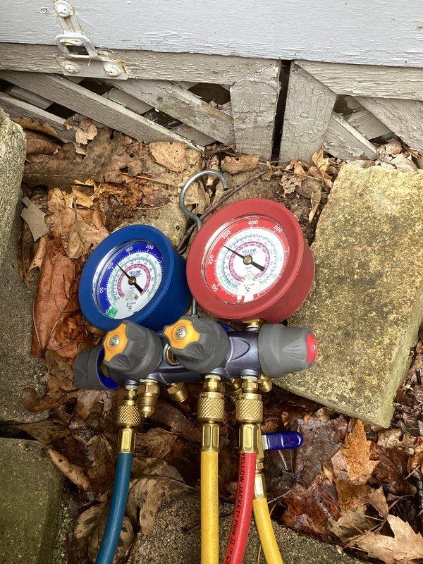 Completed comprehensive cooling system tune-up and maintenance as part of membership agreement, including full system inspection with panel access. Replaced dirty air filter showing significant dust and debris accumulation. Performed refrigerant pressure and temperature readings using manifold gauge set to verify proper system charge and operation. Discussed duct cleaning services with homeowner for future consideration.