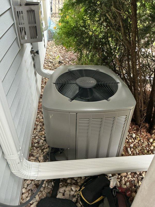 Completed routine cooling system maintenance visit as part of annual membership agreement. Performed comprehensive inspection of outdoor condenser unit, verified proper airflow through louvers and fan grille, and checked system operation. Delivered and provided spare filter as requested by customer for scheduled arrival window.