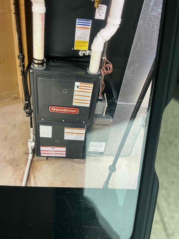 Completed comprehensive tune-up service on two air conditioning systems, including one Goodman furnace unit with integrated cooling components located in basement utility area and one outdoor condenser unit. Performed standard maintenance procedures on both systems including inspection of electrical connections, refrigerant lines, and mechanical components to ensure optimal performance and efficiency for the cooling season.