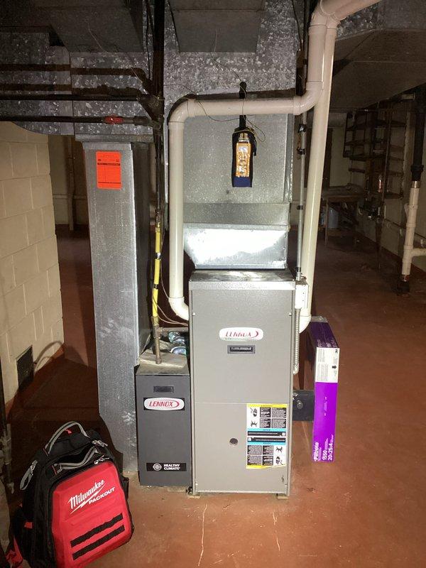 Performed comprehensive inspection of 21-year-old Lennox gas furnace and air conditioning system per customer request. Diagnosed furnace blower motor issue where fan continuously runs and fails to cycle properly in auto mode, with improper heat regulation. Inspected SureLight control board, wiring connections, and 120-volt power distribution at terminal block; evaluated all electronic components, relays, and control circuitry for proper operation. Conducted full system assessment of AC unit with no deficiencies noted. Provided customer with findings and repair recommendations for furnace blower control malfunction.