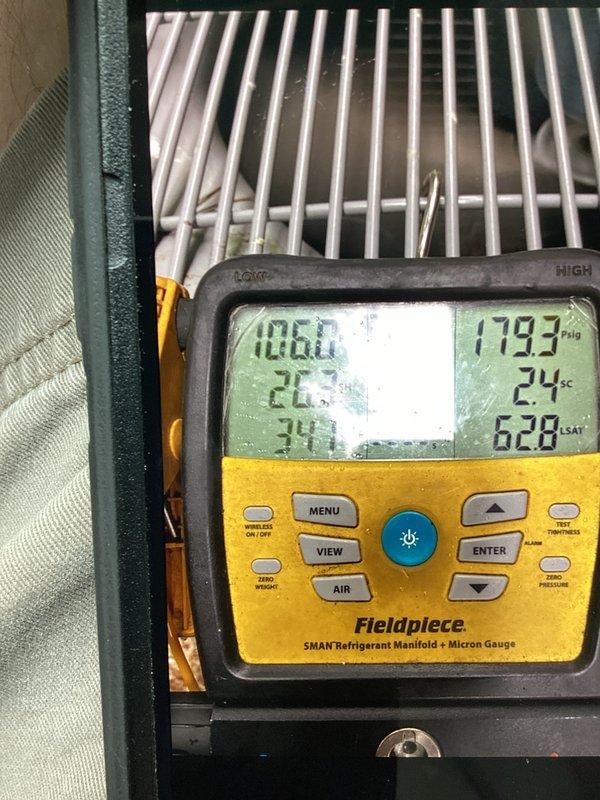 Completed scheduled cooling system maintenance visit as part of membership agreement. Performed comprehensive diagnostic testing of outdoor condenser unit using refrigerant manifold and micron gauge, measuring system pressures, temperatures, and operational parameters to verify proper cooling performance. All readings confirmed system operating within manufacturer specifications.