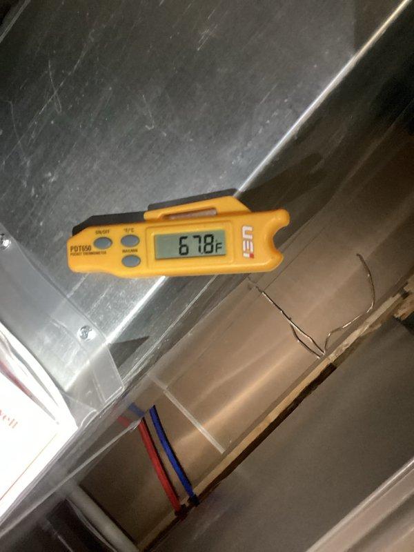 Responded to service call for A/C unit with reported refrigerant leak. Upon arrival, performed temperature diagnostics on the system, measuring supply air temperature at 52.3°F and return air temperature at 67.8°F, confirming adequate temperature differential and proper cooling operation at time of inspection. Visually inspected refrigerant lines and connections at the air handler, noting copper piping with existing insulation. System operational at time of departure, customer advised to monitor for any further issues.