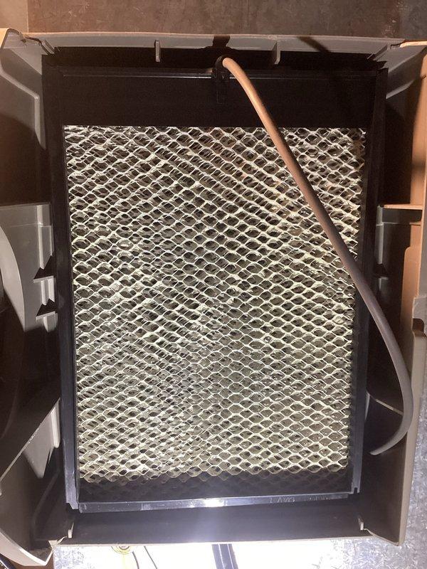 Completed annual air conditioning and furnace tune-up maintenance on residential HVAC system. Installed new Carrier GAPCCAR2025 filter, inspected outdoor condenser unit and indoor air handler components, and evaluated humidifier pad condition showing mineral buildup and scale deposits. All system components tested and operating within normal parameters upon completion.