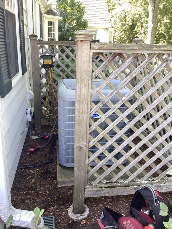 Completed annual air conditioning and furnace tune-up maintenance on residential HVAC system. Installed new Carrier GAPCCAR2025 filter, inspected outdoor condenser unit and indoor air handler components, and evaluated humidifier pad condition showing mineral buildup and scale deposits. All system components tested and operating within normal parameters upon completion.