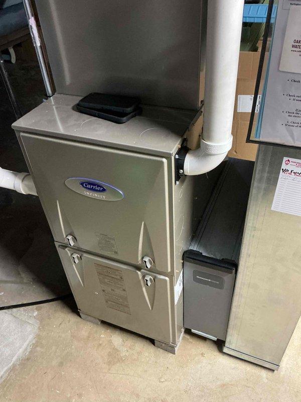 Completed preventative maintenance tune-up on Carrier Infinity furnace system. Performed comprehensive system diagnostics including electrical testing with digital multimeter, verifying capacitor readings and voltage levels to ensure proper operation. Inspected all system components, PVC venting, and air filtration unit, confirming equipment is functioning within manufacturer specifications with no issues identified.