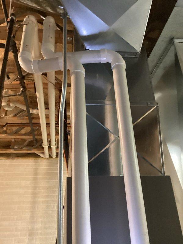 Completed furnace tune-up and air conditioning tune-up on residential HVAC system. Performed standard maintenance procedures including system inspection, temperature readings, and verification of proper operation on both heating and cooling equipment located in basement mechanical area.
