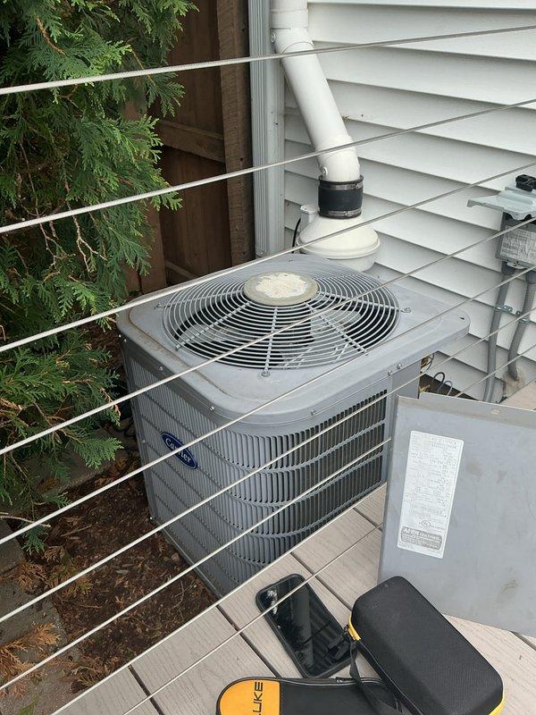 Completed annual tune-up on residential split-system air conditioning unit, performing standard maintenance procedures and system diagnostics with digital testing equipment. Addressed thermostat connectivity issues preventing remote access via mobile devices and verified proper system operation upon completion.