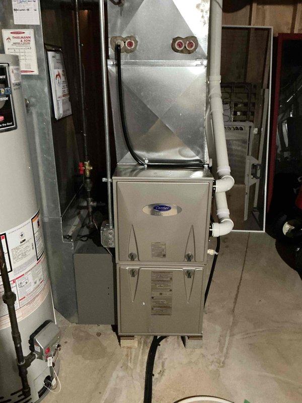 Completed preventative maintenance cooling tune-up on Carrier HVAC system as part of recurring membership agreement. Performed comprehensive system inspection including refrigerant pressure and temperature diagnostics, verified proper system operation with readings of 858 PSIG high-side and 207.5 PSIG low-side pressures, confirmed electrical amperage at 24 amps, and documented equipment condition with superheat and subcooling measurements showing system operating within manufacturer specifications.