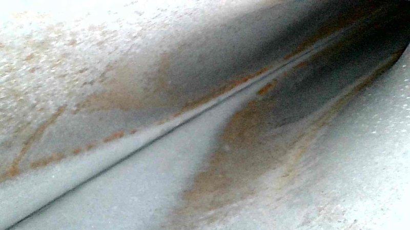 Completed comprehensive furnace tune-up and seasonal maintenance inspection. During inspection, identified significant rust staining and corrosion on refrigerant lines with deteriorated insulation indicating prolonged moisture exposure. Inspected gas valve assembly, ignition components, and electrical connections; all wiring and control mechanisms found to be functioning properly with secure connections maintained throughout system.
