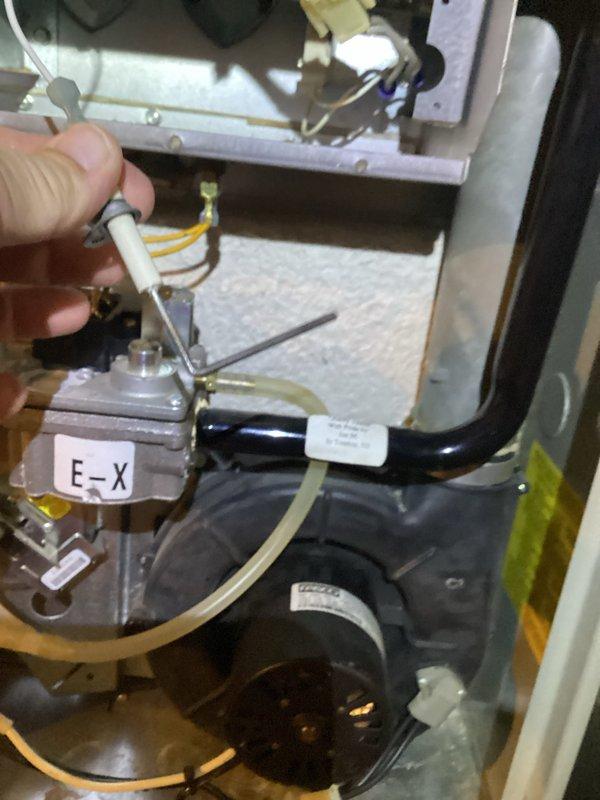 Completed comprehensive furnace tune-up and seasonal maintenance inspection. During inspection, identified significant rust staining and corrosion on refrigerant lines with deteriorated insulation indicating prolonged moisture exposure. Inspected gas valve assembly, ignition components, and electrical connections; all wiring and control mechanisms found to be functioning properly with secure connections maintained throughout system.