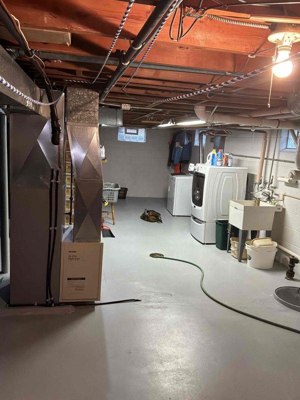 Completed electrical estimate for standby generator installation at residential property. Assessed basement area for transfer switch placement, identifying suitable location near existing electrical panel with adequate clearance from furnace and HVAC systems. Evaluated exterior mounting location adjacent to existing natural gas meter for generator pad installation, confirming gas line accessibility and proper clearances from building structure. Documented existing electrical infrastructure, utility connections, and site conditions to develop comprehensive material and labor requirements for automatic transfer switch installation and generator hookup.