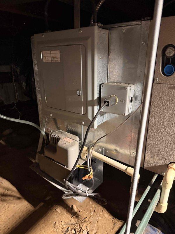 Completed comprehensive tune-up service on oil furnace system located in basement utility area and mini-split air handler unit installed in attic crawl space. Performed standard maintenance procedures including inspection of all electrical connections, ductwork, and system components to ensure proper operation and efficiency for both heating and cooling systems.