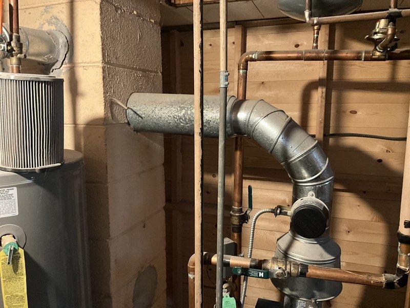 Completed comprehensive estimate for replacement of existing boiler system and attic-mounted air handler unit. Assessed current equipment configuration including boiler without indirect water heating tank, documented all mechanical connections, gas piping, copper water lines, and galvanized ductwork in basement mechanical room. Evaluated attic accessibility via interior stairs for air handler replacement and provided customer with replacement options for both heating and cooling system components.