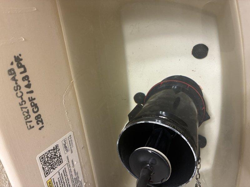 Responded to service call for toilet with randomly activating float mechanism. Upon inspection, identified faulty flush valve gasket causing improper sealing and erratic float operation. Removed existing deteriorated gasket from flush valve assembly and replaced with new Gasket-Pro toilet canister seal. Tested flush mechanism for proper operation and verified float system functioning correctly with no random activation. System restored to normal operation.