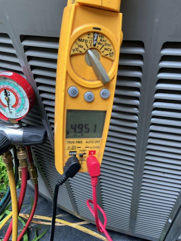 Completed routine cooling system maintenance visit as part of membership agreement. Performed comprehensive diagnostic testing of outdoor condensing unit, including voltage measurements reading 495.1V and refrigerant pressure analysis using manifold gauges. Inspected electrical components including capacitor, contactor, and associated wiring connections to ensure proper operation and safety compliance.