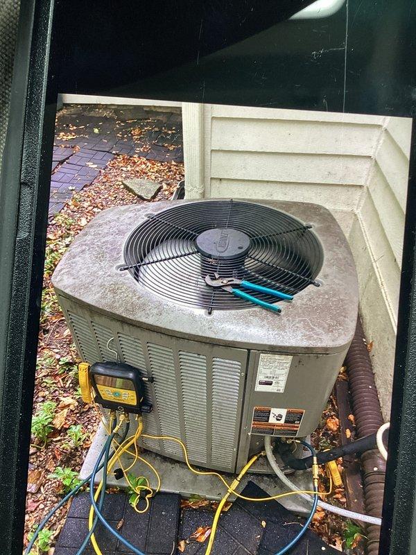 Completed prepaid maintenance cooling visit including comprehensive A/C tune-up and system performance evaluation. Connected refrigerant manifold gauges to outdoor condensing unit and recorded operating pressures and temperatures. System readings indicated 120.9 PSI suction pressure, 236.0°F discharge temperature, 31.9°F superheat, and 73.7°F subcooling. Performed clean and check procedures on air conditioning system components. Cleaned and inspected humidifier water panel as part of scheduled maintenance. All system parameters verified within acceptable operating ranges for optimal cooling performance.