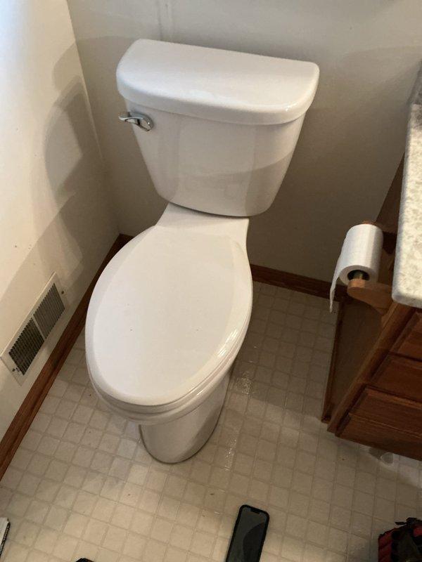 Completed installation of customer-supplied toilet after assessing alignment with existing floor flange. Successfully mounted and secured new two-piece toilet to floor, connected braided stainless steel supply line to tank, and tested for proper operation and seal. Identified leaking shut-off valve during initial inspection and brought to customer's attention for potential future service. Verified flush mechanism functionality, checked for leaks at all connection points, and confirmed stable mounting on existing tile floor.