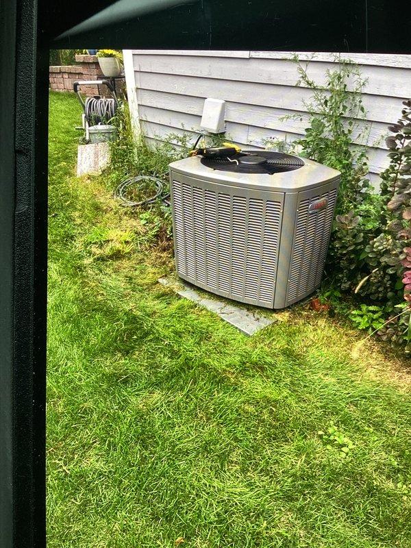 Completed furnace and air conditioning tune-up on residential Lennox HVAC system. Performed comprehensive diagnostics using digital meter to verify system temperatures and operational parameters, inspected outdoor condenser unit positioned on exterior pad, and confirmed all components operating within manufacturer specifications. Customer requested afternoon appointment due to work schedule; prior contact was made before arrival as requested.