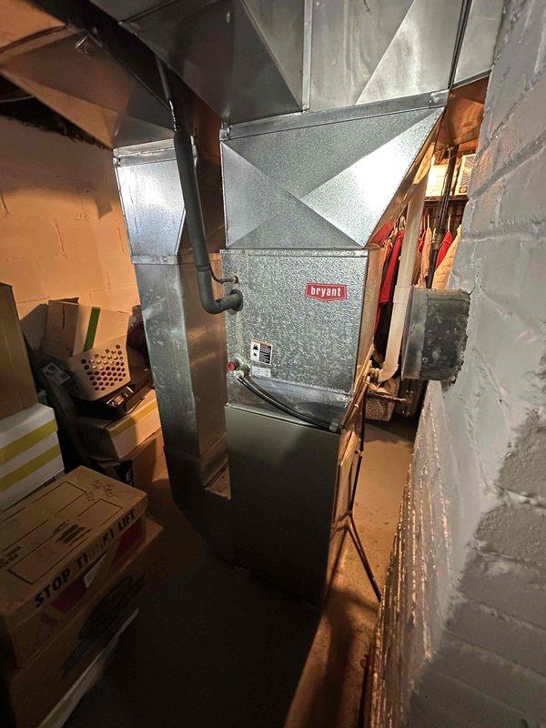 Conducted on-site assessment for HVAC system replacement at residential property. Evaluated existing Bryant furnace located in basement mechanical room and outdoor AC condenser unit on rear patio, both currently operational. Provided comprehensive estimate for replacement of natural gas furnace and air conditioning system, including equipment specifications, installation requirements, and ductwork connections.