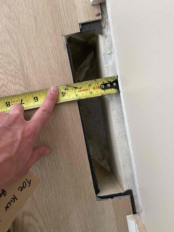 Returned to installation site to address register placement. Documented floor register opening dimensions and cavity conditions for proper register fitting. Measured opening to ensure correct register size selection and verified ductwork accessibility for secure installation.