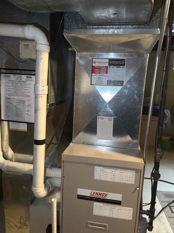 Conducted on-site assessment of existing residential natural gas furnace system for replacement estimate. Evaluated current Lennox furnace installation in basement utility room, including associated air handler, ductwork configuration, PVC venting system, and condensate drain lines. Documented equipment specifications, existing infrastructure, and spatial requirements through photographic documentation to provide accurate replacement proposal for new natural gas furnace system.